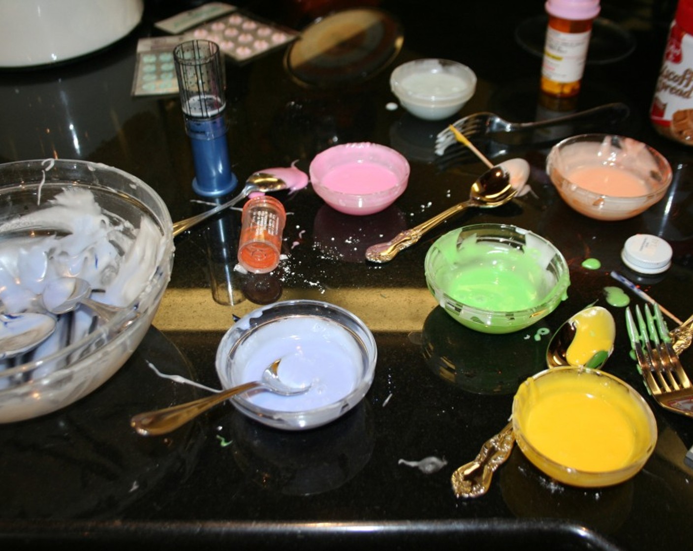 step 10 Divide the mixture depending on how many color dyes you have. I divided into 6 small bowls and mixed in the Food Coloring (to taste).
