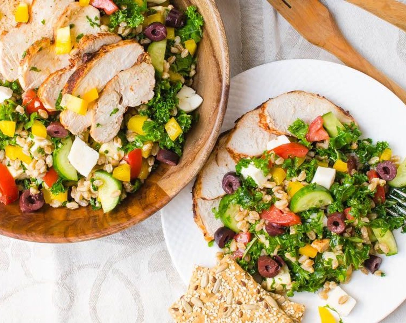 step 5 Add the cooled farro and the dressing to the salad and toss to combine completely. If you're serving the Chicken (2 cups) sliced, fan it out over the top of the salad and serve. Enjoy!