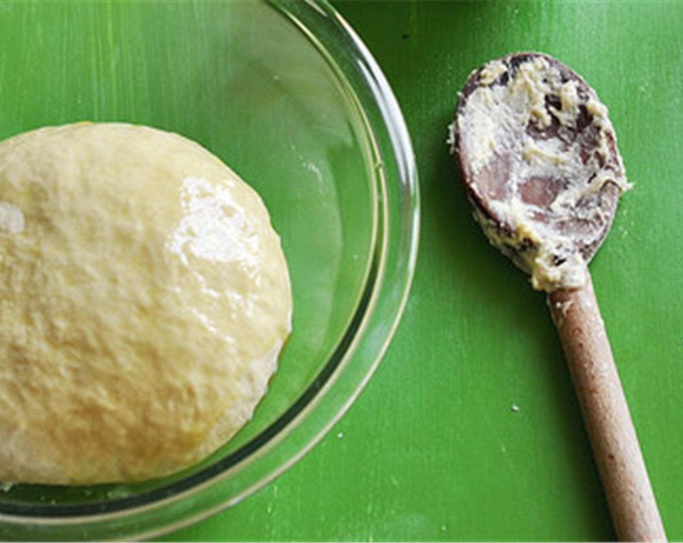 step 4 Return the dough to the mixing bowl, that has been greased and turn it over to coat both sides. Cover with plastic wrap, loosely, or a damp kitchen towel. Set in a warm place to double in size, about 1 hour.