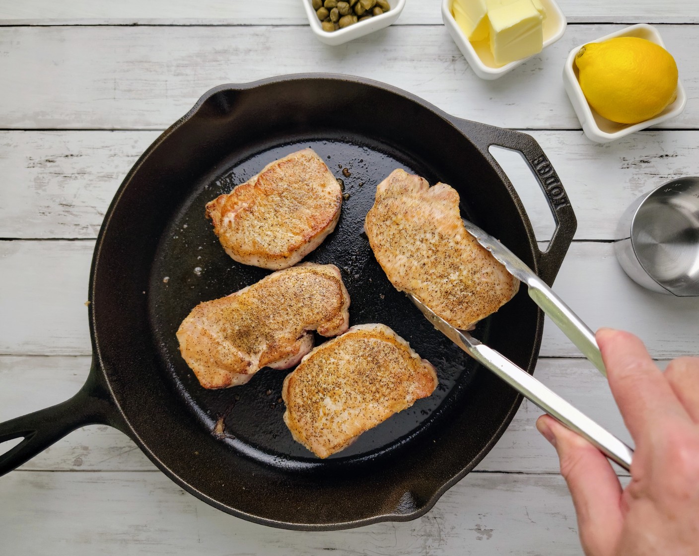 step 6 Remove the pork chops from the pan. Save the pan for the sauce.