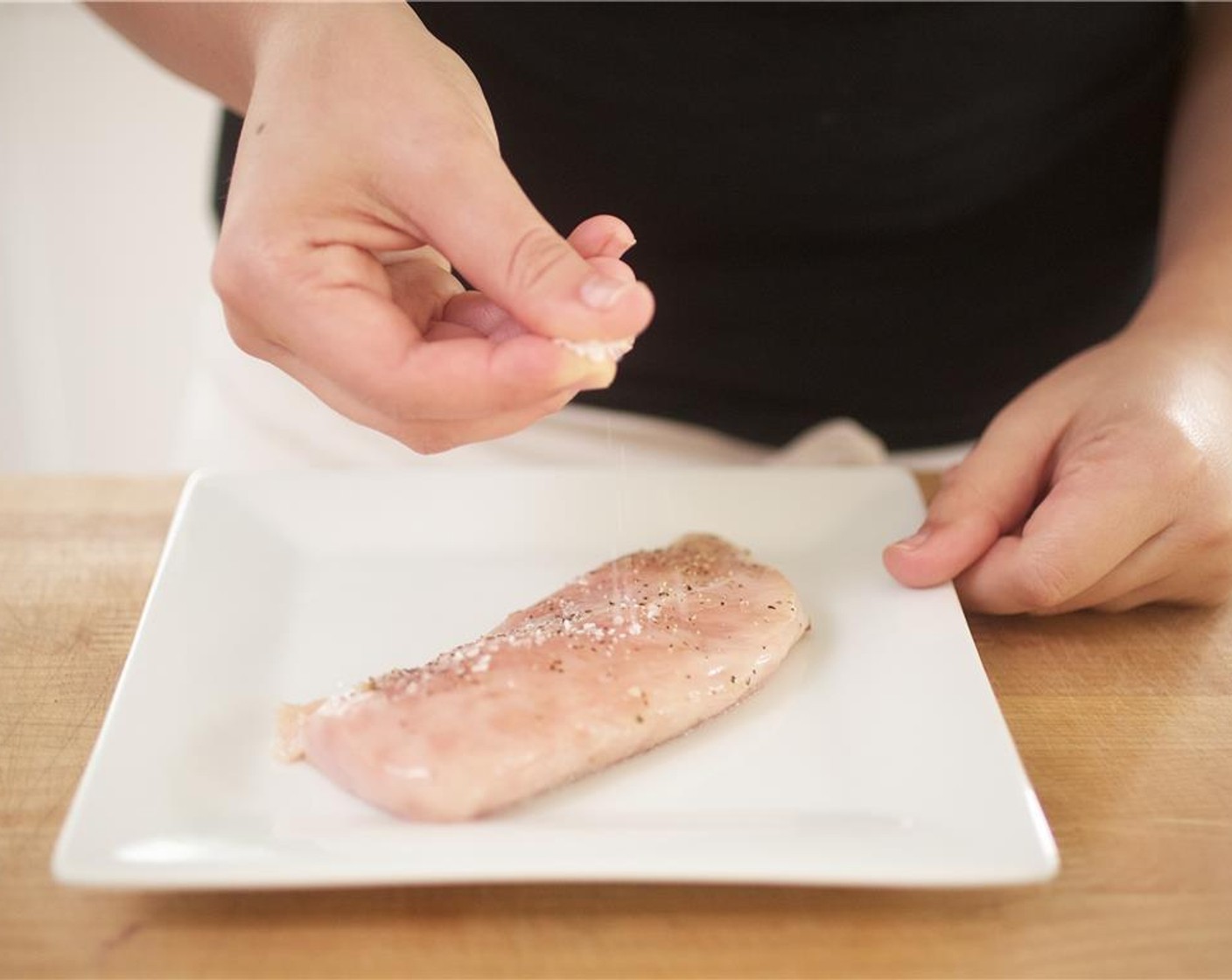 step 4 Pat Chicken Breast (1) dry and season with 1/4 teaspoon each of salt and pepper.