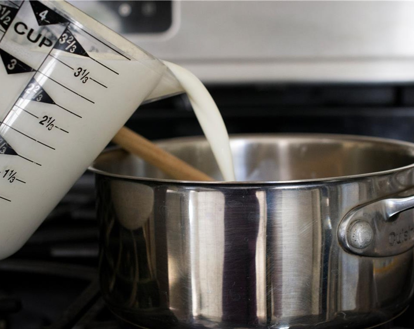 step 2 In a large saucepan over medium-high heat, add the gelatin/milk mixture, heat until the gelatin has melted, but do not let the contents boil.