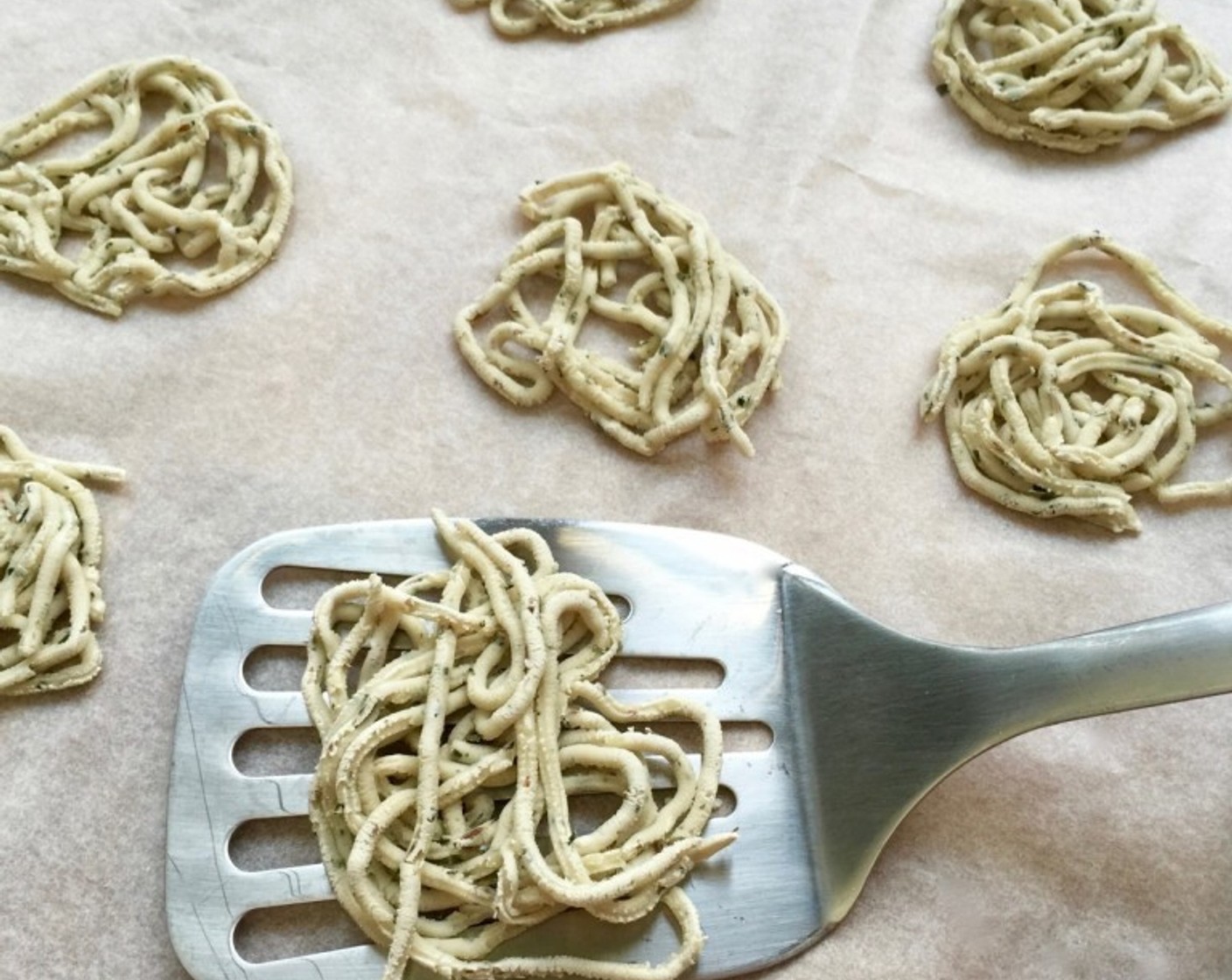 step 12 Or make the murukku first and then carefully drop them into the oil using a stainless steel spatula.