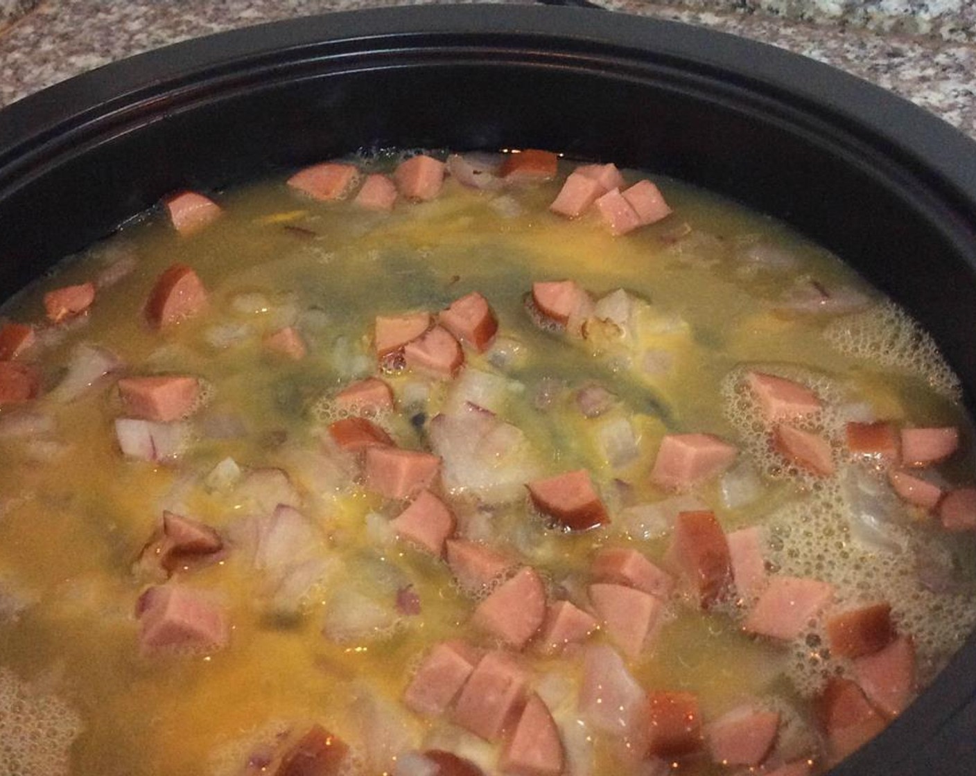 step 5 Add the beaten eggs. Continue to stir them over low heat to prevent overcooking.