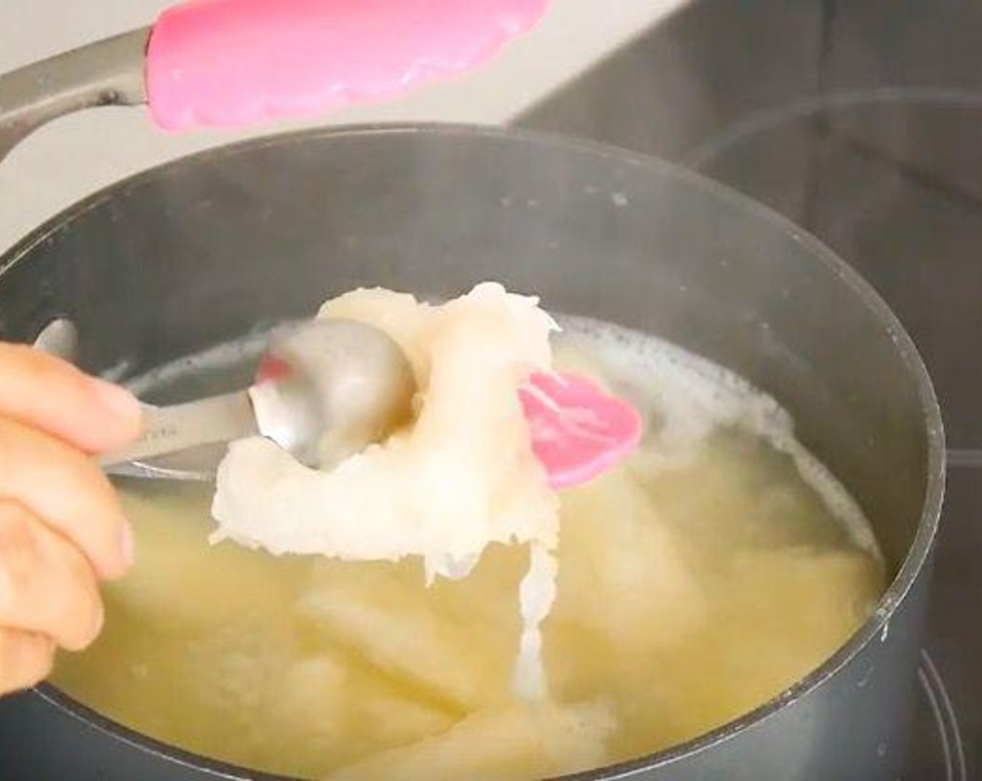 step 1 Boil the Cassava (2 1/2 cups) until is very very soft, almost to the point of dissolving. This can take 20 to 25 or more depending on the cassava. Once boiled place in a bowl leave to cool down.