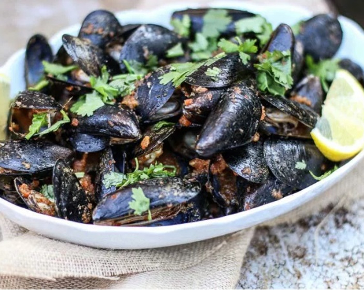 step 9 Remove pot from heat. Place mussels and sauce in a serving dish. Discard any unopened mussels.