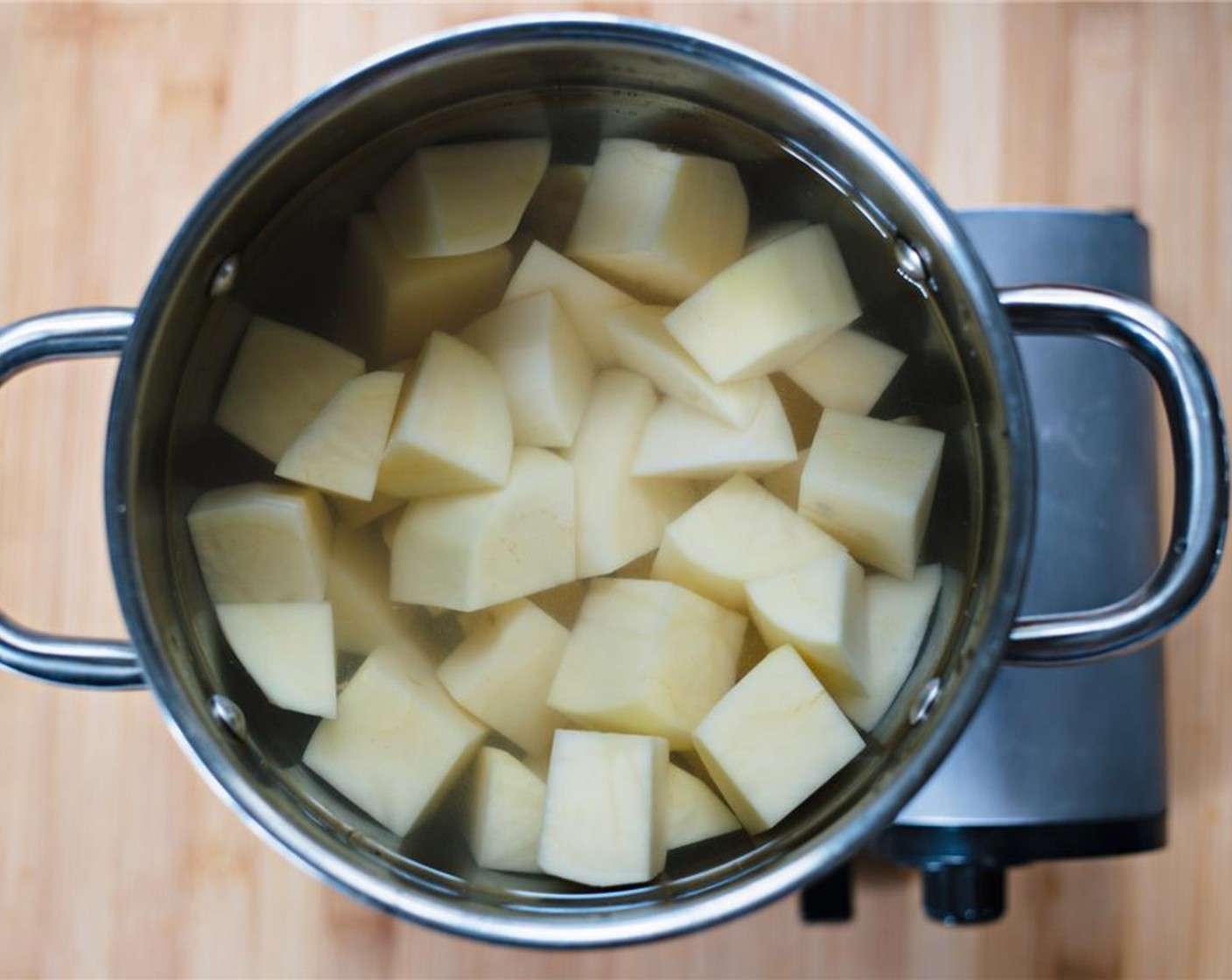 step 4 Place russet potatoes into a pot filled with salted water.