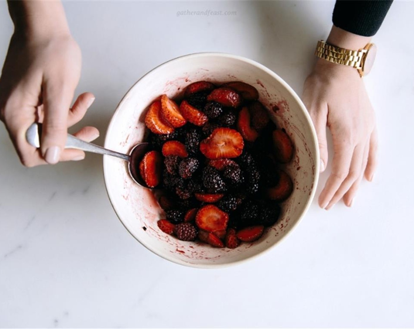 step 3 For the berry mixture, slice the Fresh Strawberries (3 1/3 cups) and mix them in a bowl with the Fresh Blackberries (3 1/2 cups), Rice Malt Syrup (3 Tbsp), Vanilla Powder (1 Tbsp), a few leaves of Fresh Mint (1 bunch) and set aside.