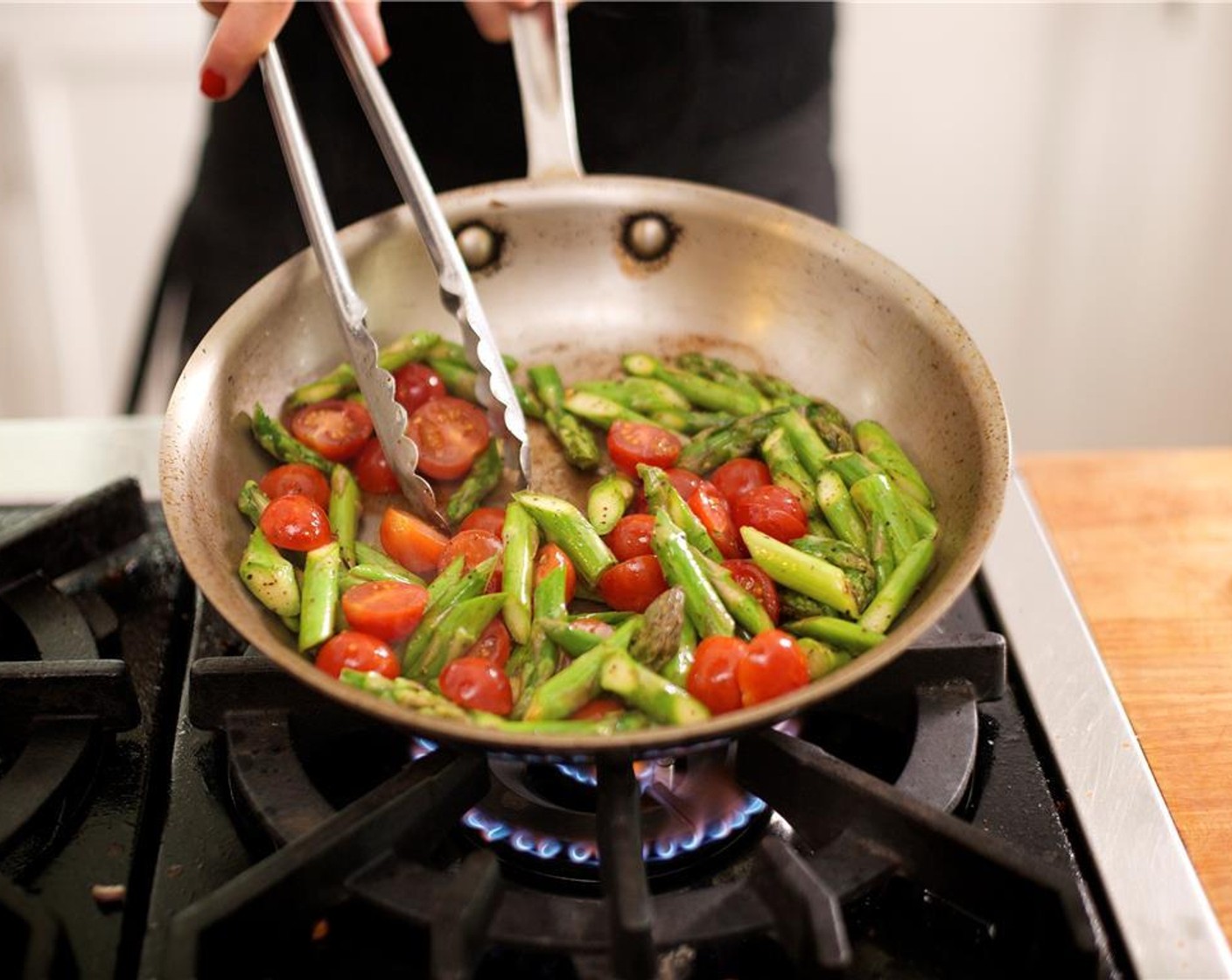 step 18 Add Tomatoes to the pan and sauté for an additional minute.