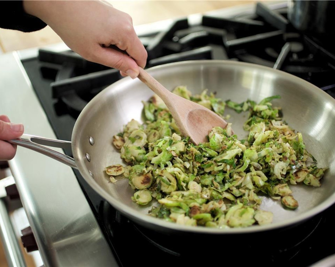step 6 Heat a medium saute pan over medium-high heat, add Olive Oil (1 Tbsp). Once pan is hot add the Brussel sprouts and a pinch of salt and a pinch of pepper. Cook for 5 minutes, and set aside.