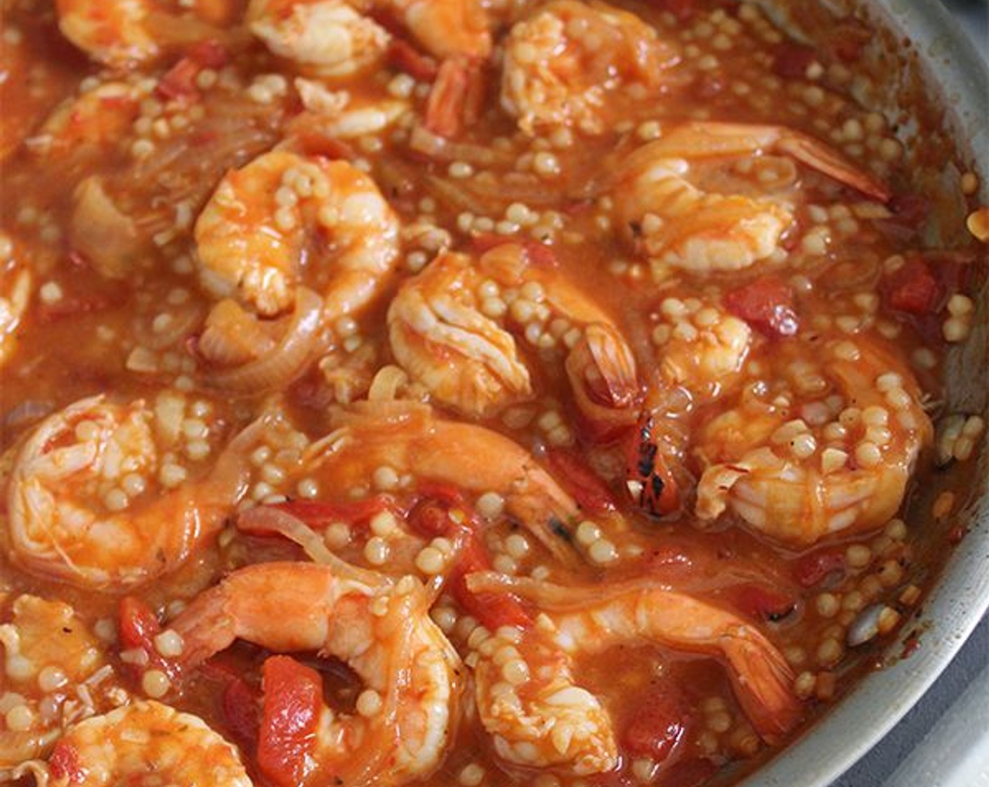 step 6 Add the shrimp to the pan, stirring to submerge them in the sauce, and simmer for 3 minutes, until they are just cooked through. Off the heat, stir in the Sherry Vinegar (1/2 Tbsp).