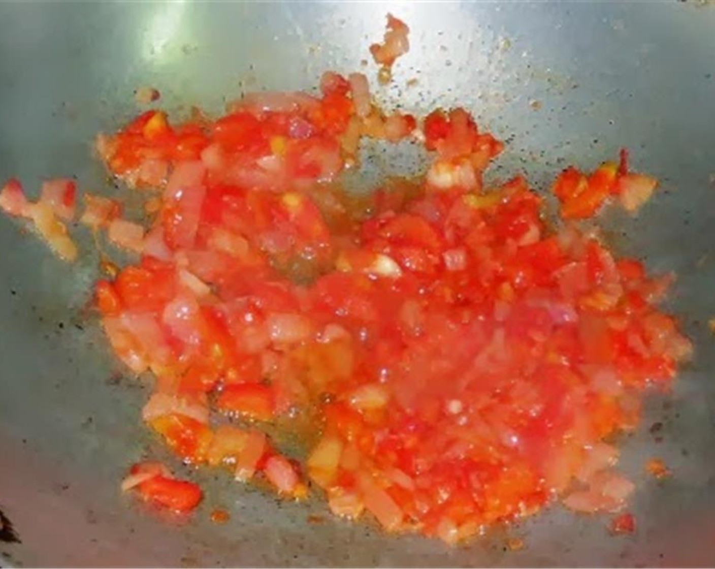 step 4 Add tomato and mix well. Keep stirring frequently or the mixture might burn.