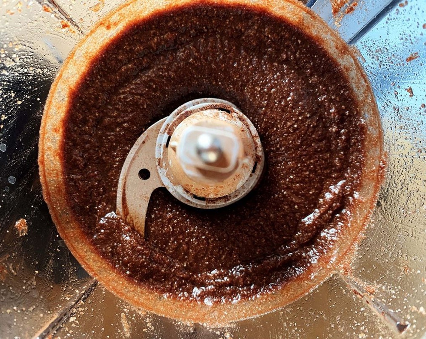 step 2 Turn on high and blend, stopping and scraping the sides of the bowl a few times. When a paste starts to form, slowly add the Almond Oil (2 Tbsp), 1 tbsp at the time. (NOTE: if you have a very powerful food processor, you might not need to add the oil, so wait and see).