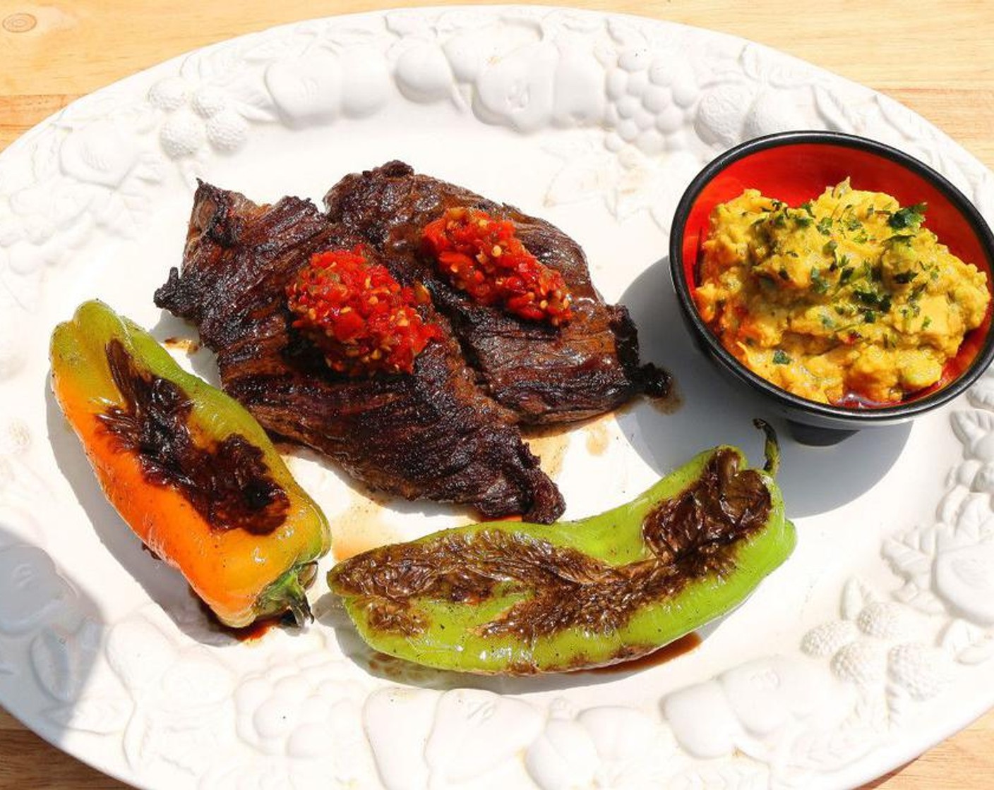 step 4 Saute steaks and peppers in Peanut Oil (2 Tbsp) until peppers are blistered and steaks are cooked according to your liking, serve with mashed avocados on the side, top the steaks with the Cherry Pepper Relish (to taste). Enjoy!