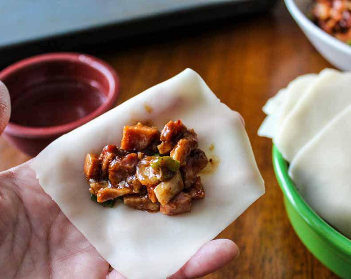 step 2 To wrap the Dumpling Wrappers (1 pckg), fill the center with a teaspoon of filling or less if you like a more chewy crispy dumpling.