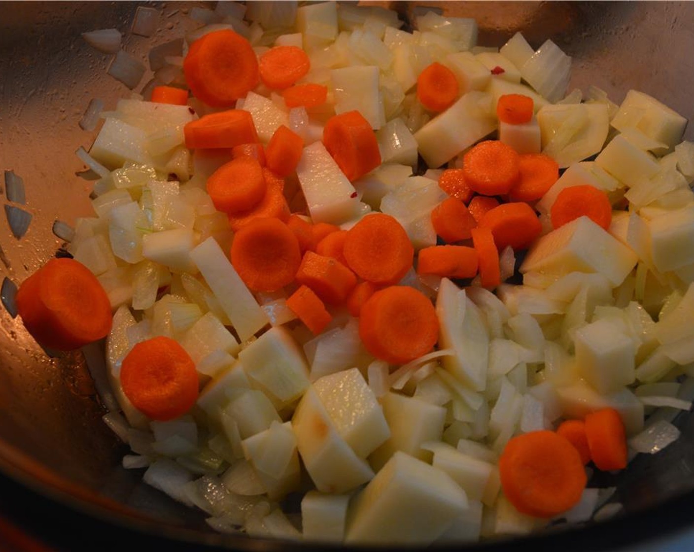step 1 Heat Extra-Virgin Olive Oil (1 1/2 Tbsp) on medium-low heat in a large soup pot and add chopped Onion (1) , Carrot (1), and Potato (1). Allow vegetables to soften, about 5 minutes, while stirring every minute or so.