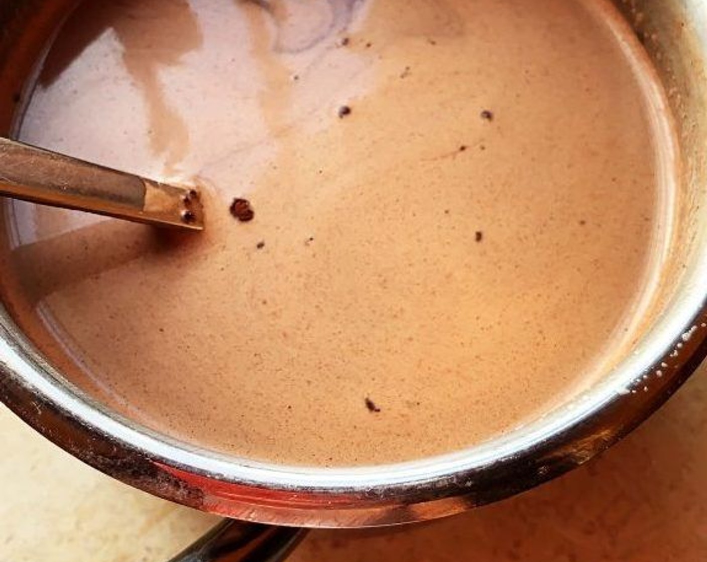 step 3 Slowly stir in the milk. Move the bowl to your fridge to chill.