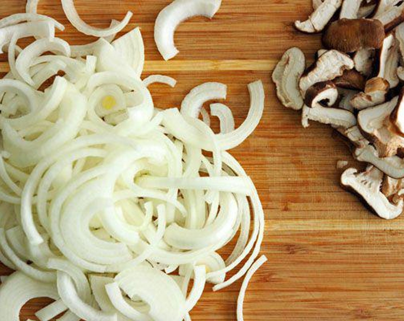 step 1 Peel the Yellow Onions (2), then chop them into quarters. Slice the onions so that the pieces form crescent-shaped strips about 3″ long. Chop the Mushroom (1 cup).
