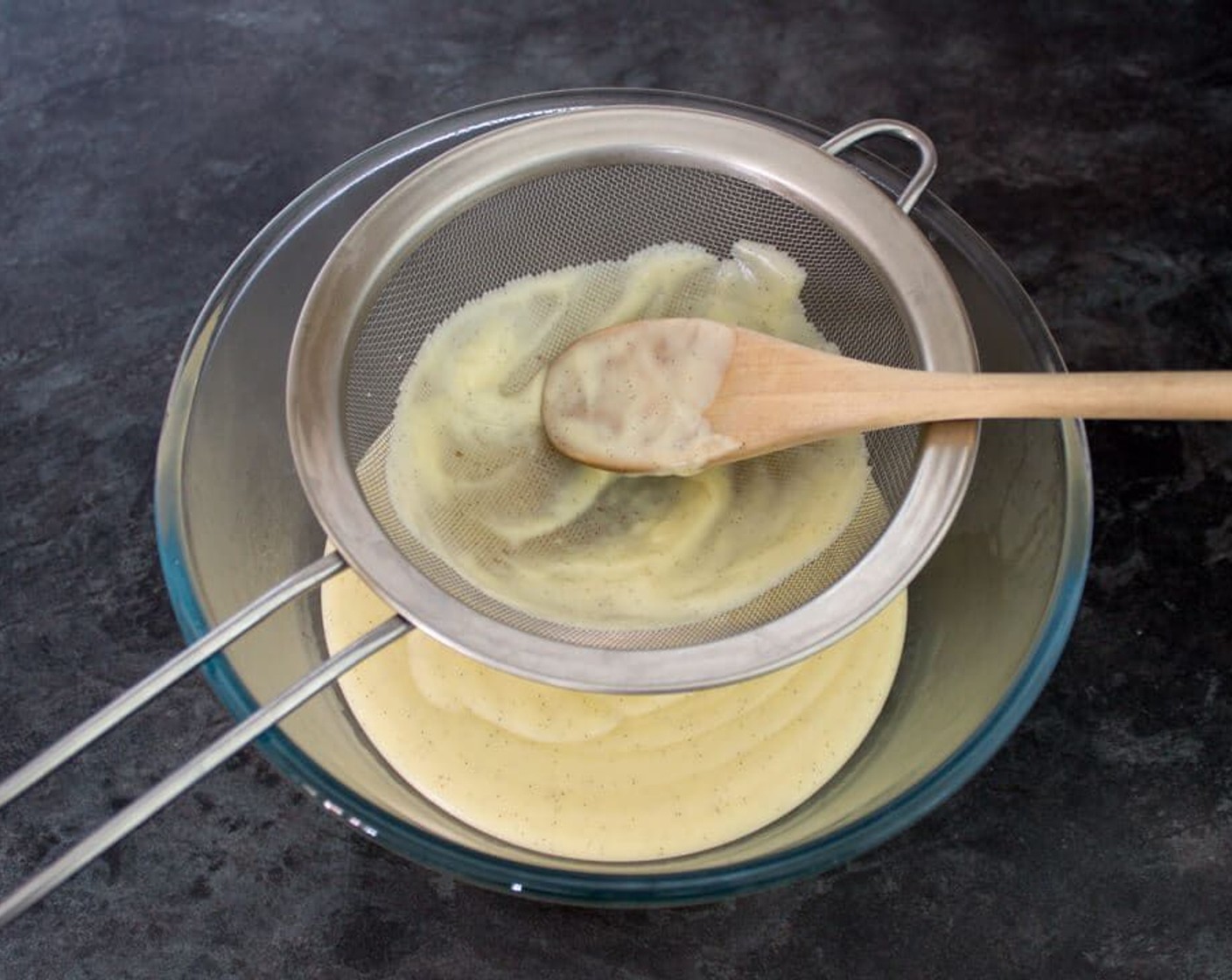step 19 Pass the creme patissiere through a sieve then stir in the Unsalted Butter (1 1/2 Tbsp) to melt through.