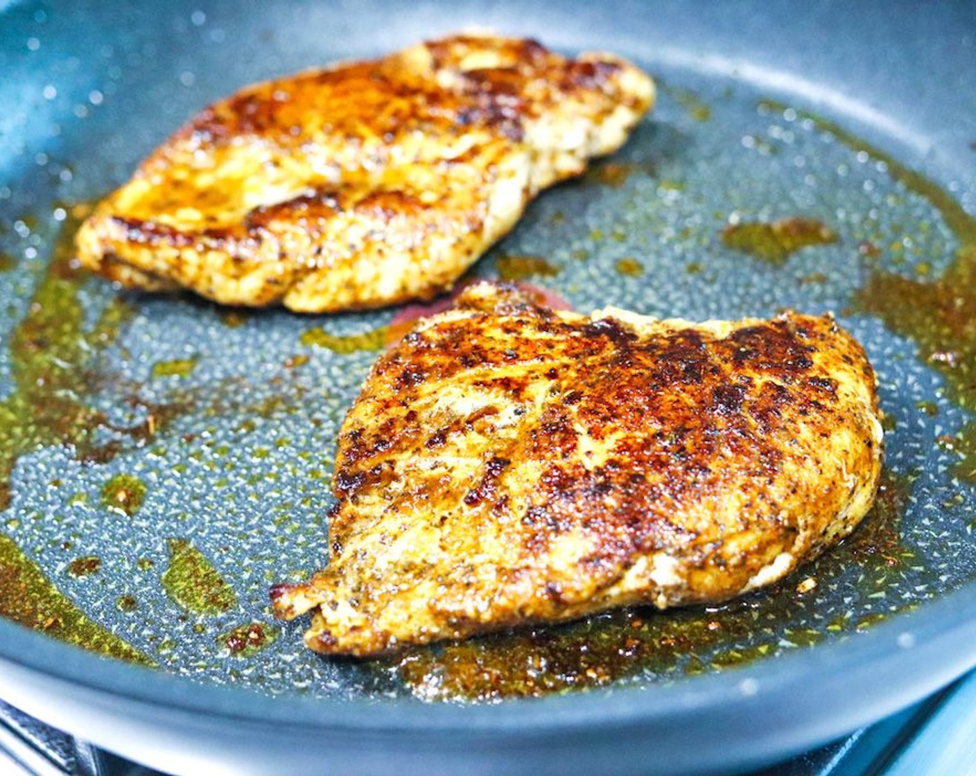 step 4 Heat Olive Oil (1 Tbsp) in a large sauté or nonstick fry pan, or a pan grill/griddle over medium-high heat. Once the pan is hot, add the chicken breasts and cook for 4-6 minutes to allow for the seasoning to set in. Then use tongs to turn them over and cook the other side for another 4-6 minutes, or until fully cooked through and no longer pink inside. Transfer the chicken breasts to a chopping board and allow to rest and cool for 15-20 minutes.