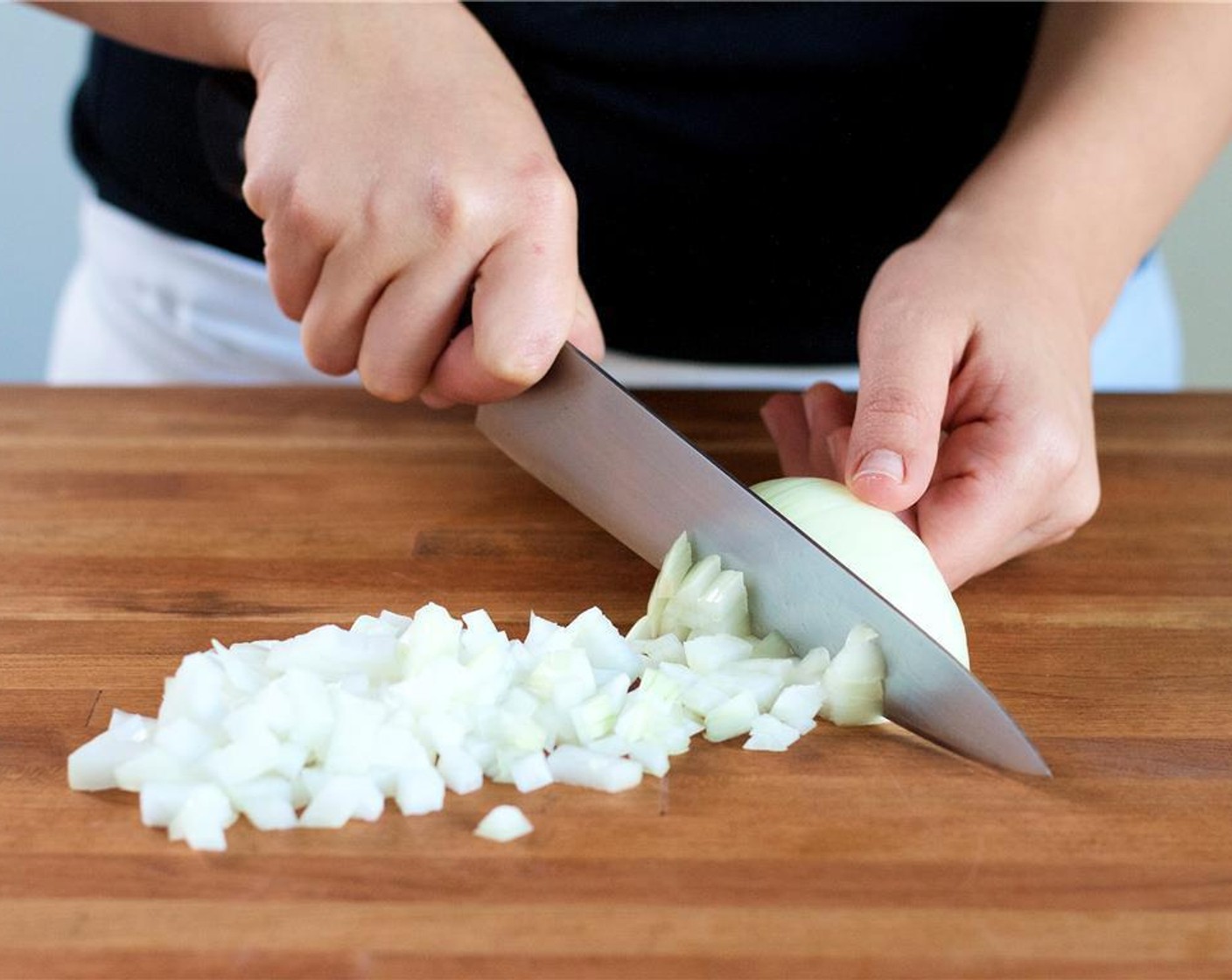 step 1 In a large saucepan, add eight cups of water with Salt (1/2 Tbsp), cover, and bring to a boil over high heat. Meanwhile, finely chop Garlic (2 cloves) and set aside. Chop Onion (1) into quarter inch pieces and set aside.