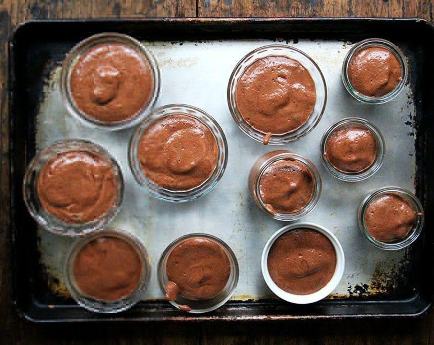 step 3 Fold the whipped aquafaba into the chocolate-almond milk mixture in batches—be delicate. Transfer the chocolate mousse into small serving vessels, then transfer to the fridge to let the mousse set up — in about an hour it will start to set. Store in fridge.