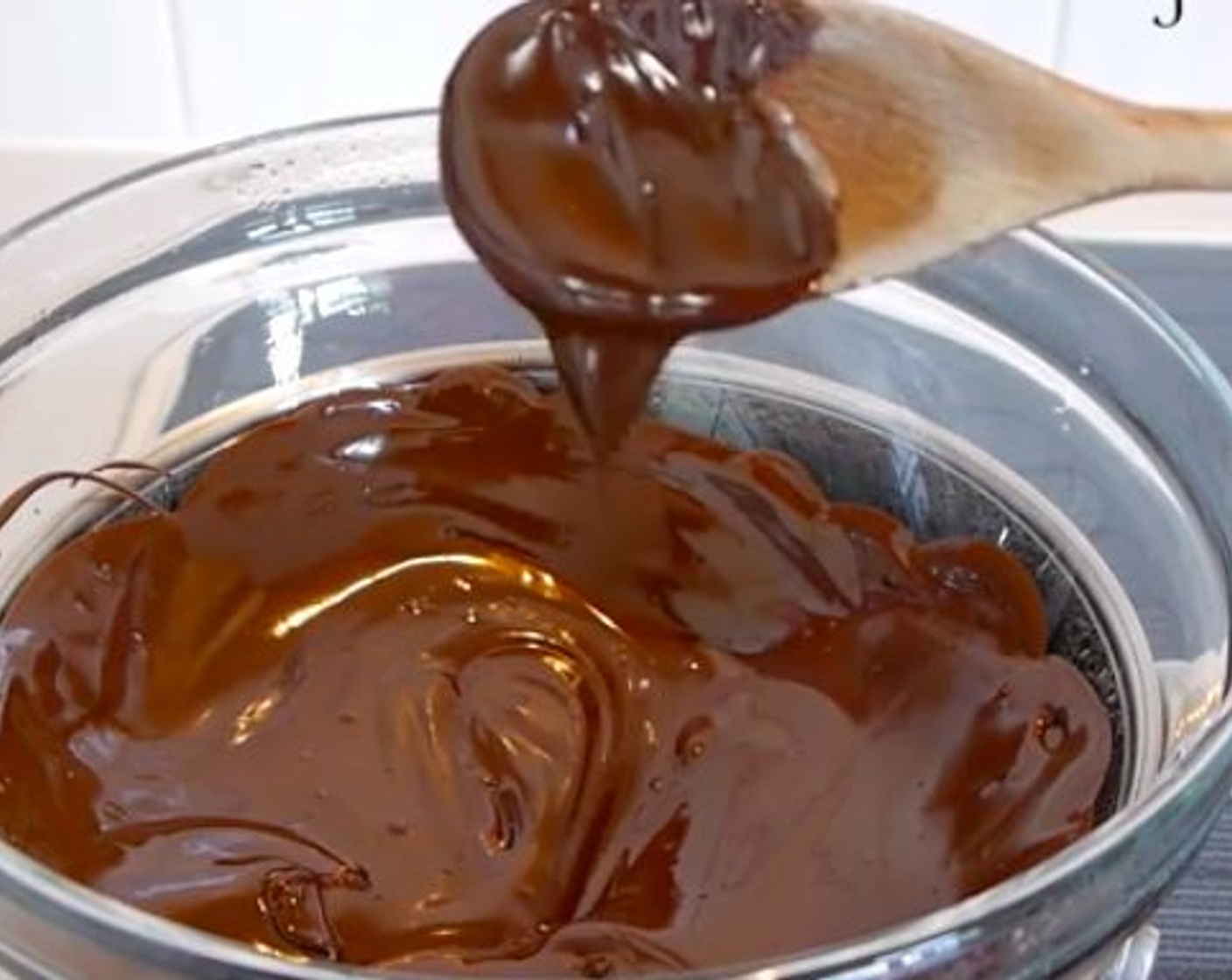 step 1 Melt the 70% Dark Chocolate (1 cup) and Unsalted Butter (2 Tbsp) in a bowl over boiling water. When melted set aside to cool down.