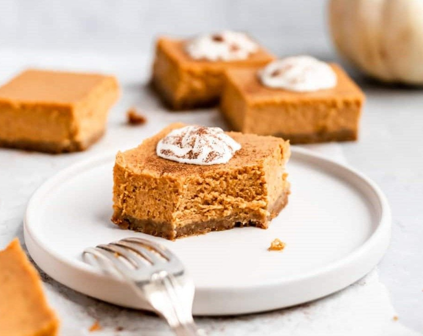 step 13 To serve, use a large, sharp knife to cut into squares. I recommend wiping the knife clean with a damp cloth between slices. Serve with a dollop of whipped topping and enjoy!