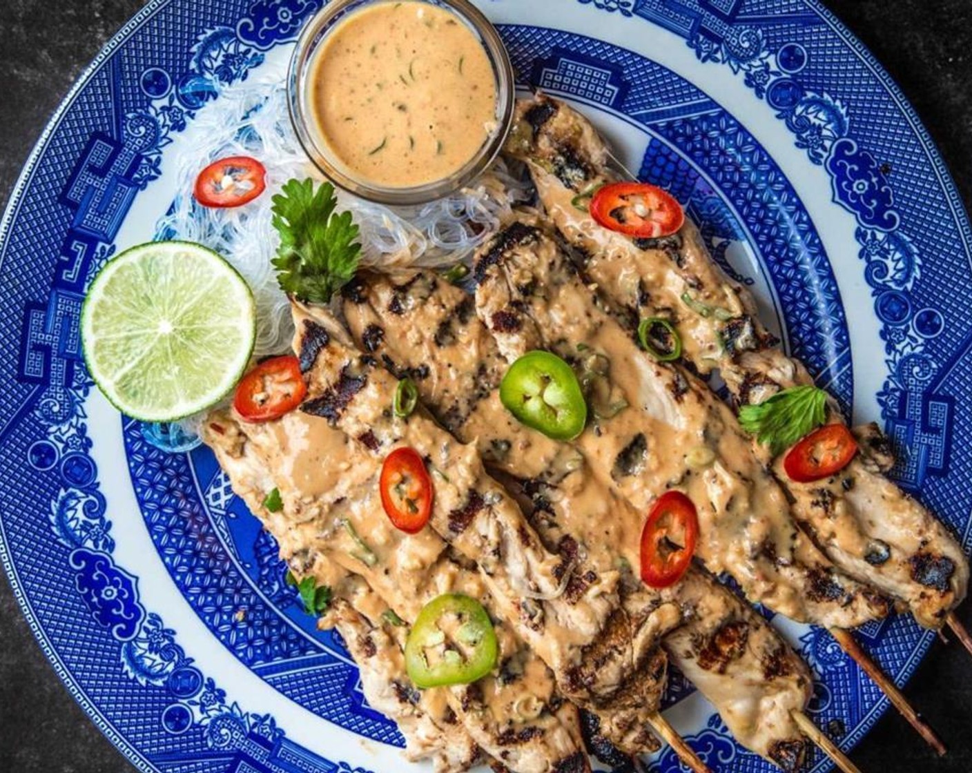 step 9 Serve the satay skewers immediately with the noodles and reserved dipping sauce.