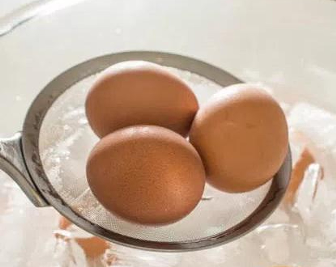 step 3 Transfer the eggs into an ice bath and allow them to chill for 3 minutes.