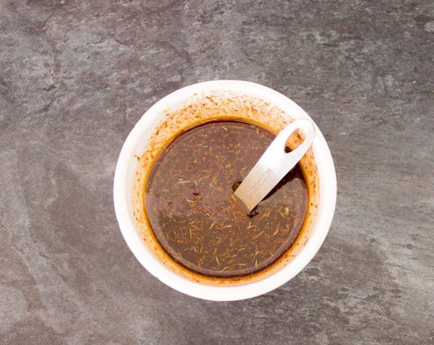 step 1 In a small bowl mix Smoked Paprika (1 1/2 Tbsp), Sea Salt (1 Tbsp), Ground Black Pepper (1 tsp), Cayenne Pepper (1/2 tsp), Simply Organic Garlic Powder (1/2 tsp), and Dried Thyme (1/4 tsp). Then add in Honey (4 Tbsp), Red Wine Vinegar (2 Tbsp), Barbecue Sauce (2 Tbsp), and Olive Oil (1 1/2 Tbsp). Give it all a good mix and set to one side.