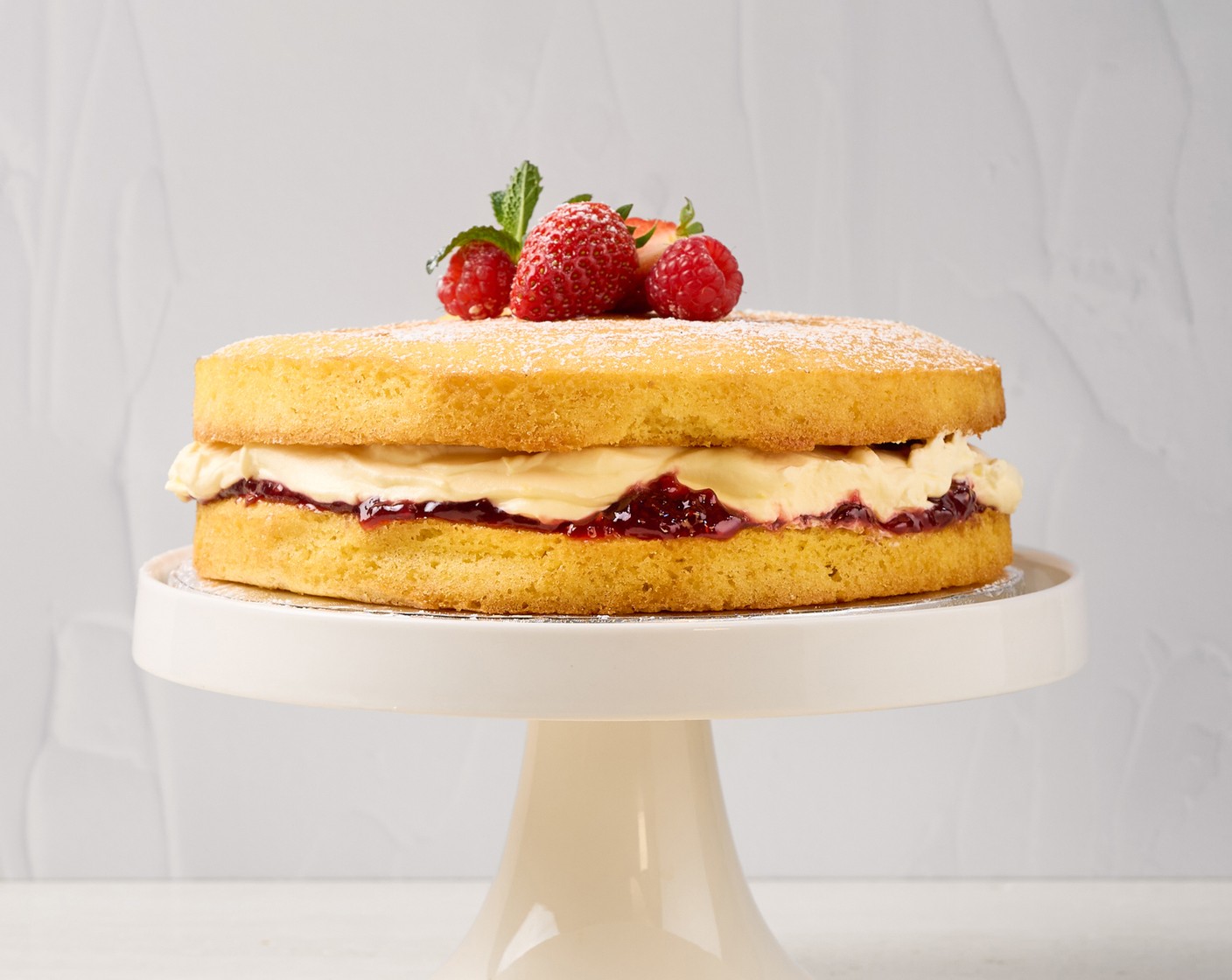 step 12 Optionally, garnish with Fresh Strawberry (2/3 cup), Fresh Raspberry (3/4 cup), and Fresh Mint (2 sprigs). Sprinkle powdered sugar on top. Slice and serve.