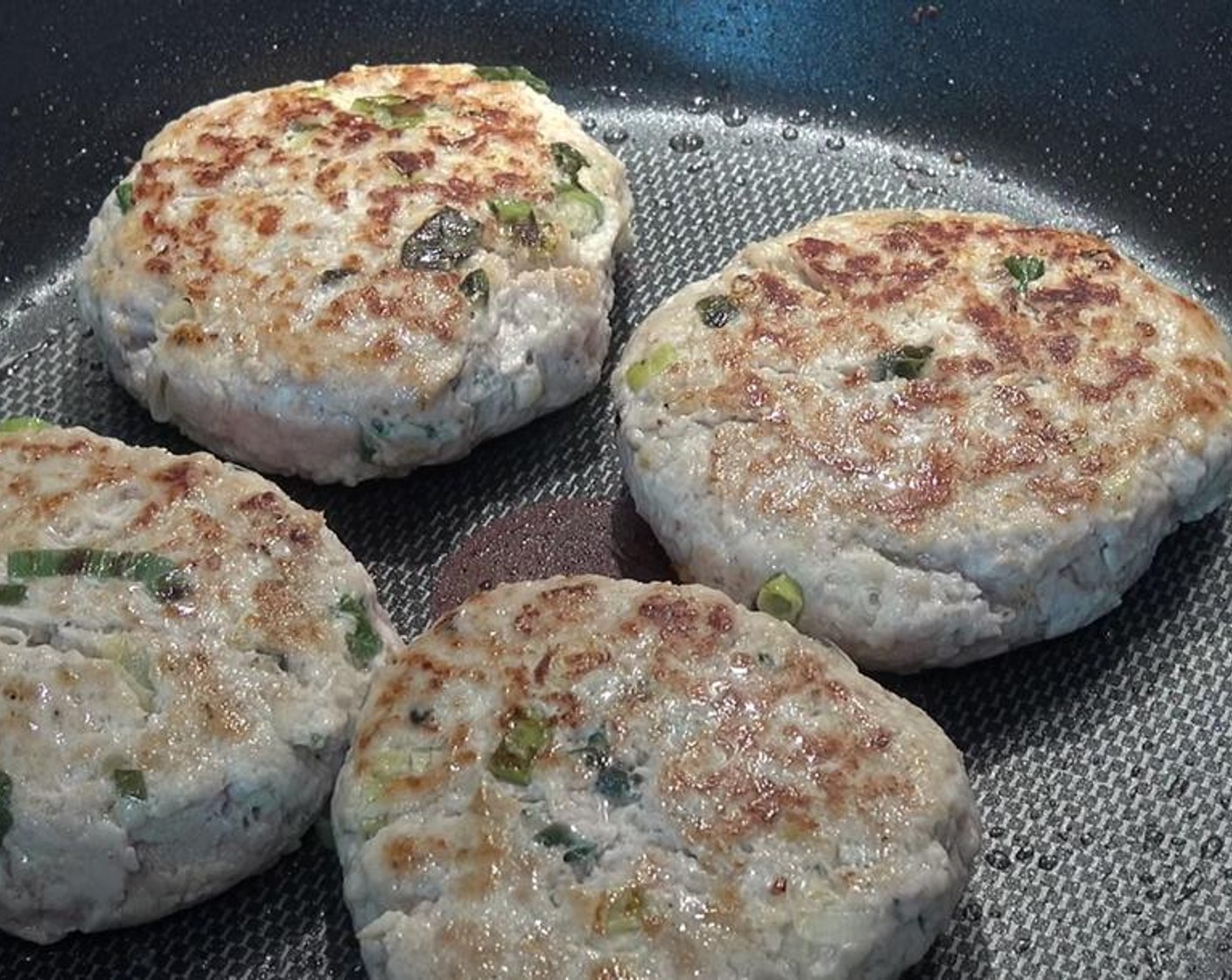 step 6 Cook and turn patties for about 5 to 7 minutes, or until they are cooked all the way through. Once fully cooked, set aside.