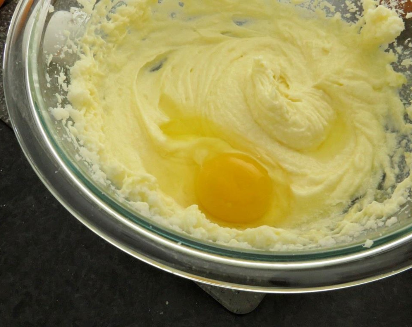 step 4 In a large bowl, using an electric mixer on medium speed, beat together softened unsalted butter and Granulated Sugar (1 cup) until light and fluffy (1 1/2-2 minutes). Add Farmhouse Eggs® Large Brown Eggs (3), one at a time, beating well after each addition.