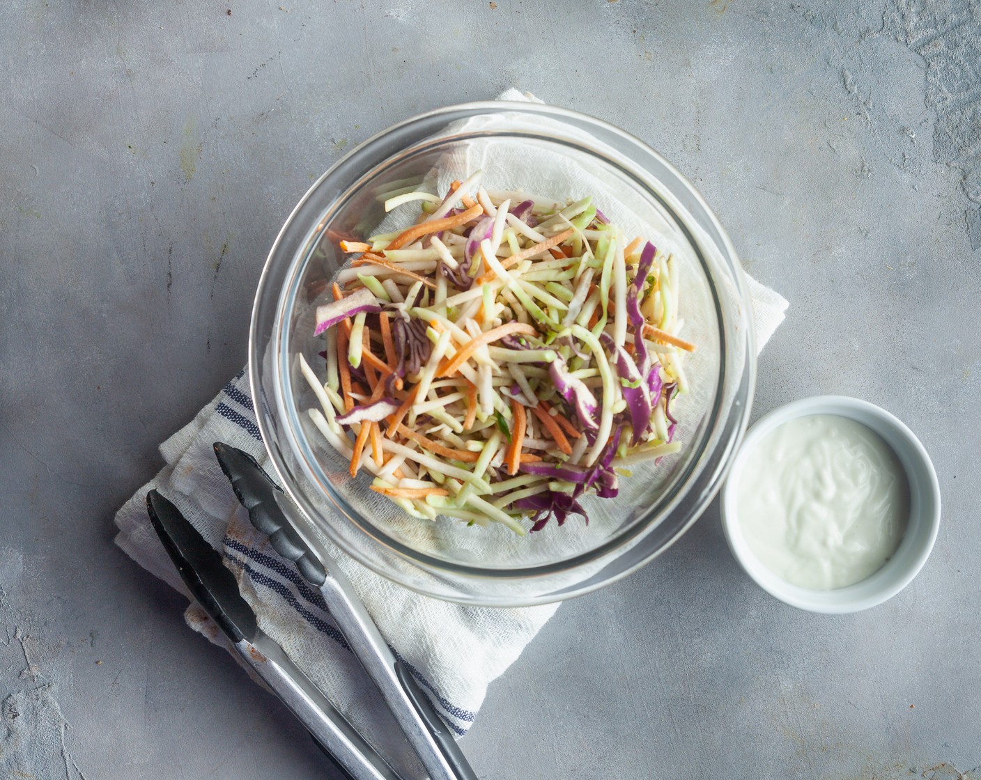step 4 In a mixing bowl, combine the Coleslaw Mix (1 bag) with the Chunky Blue Cheese Dressing (1/4 cup).