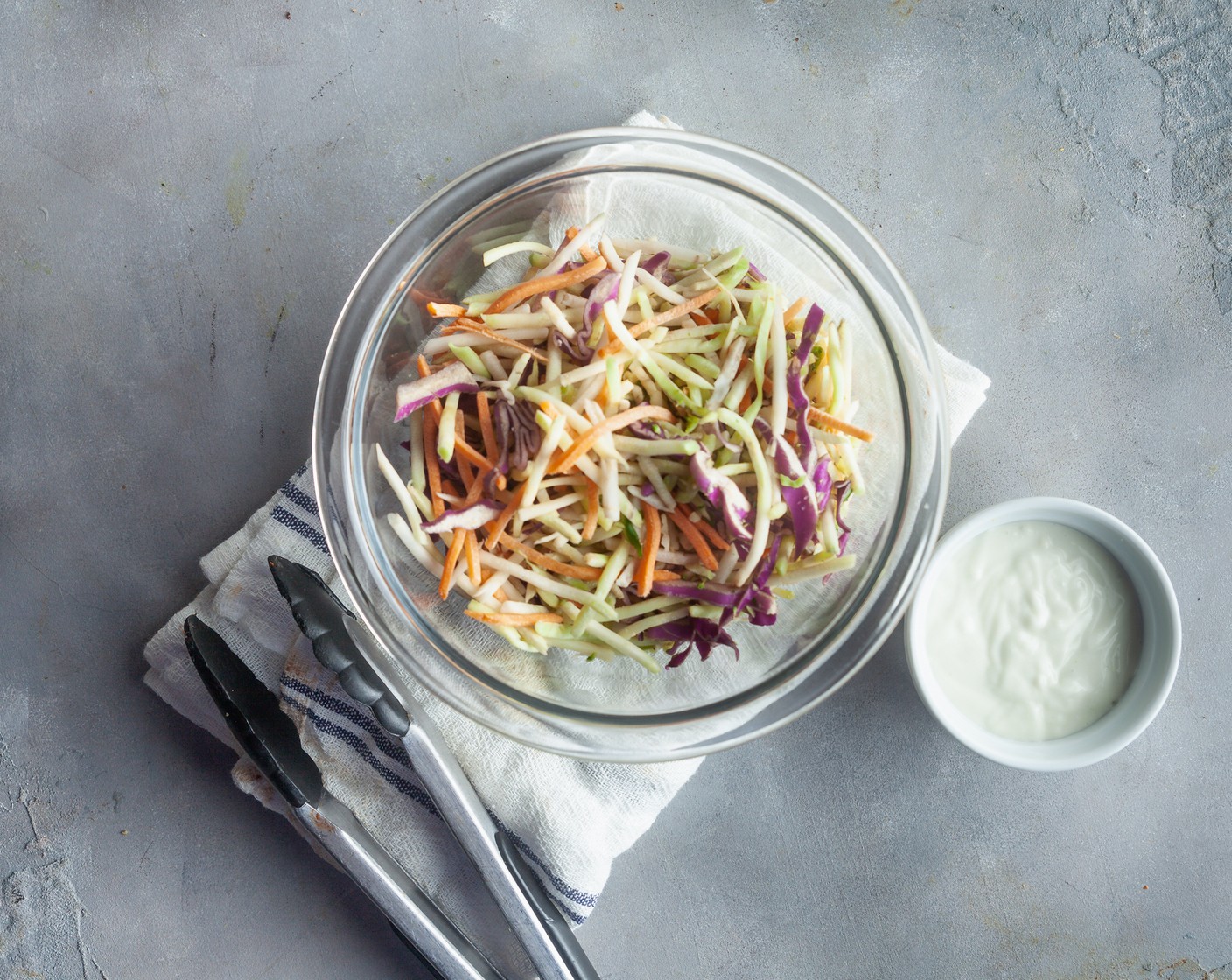 step 4 In a mixing bowl, combine the Coleslaw Mix (1 bag) with the Chunky Blue Cheese Dressing (4 Tbsp).