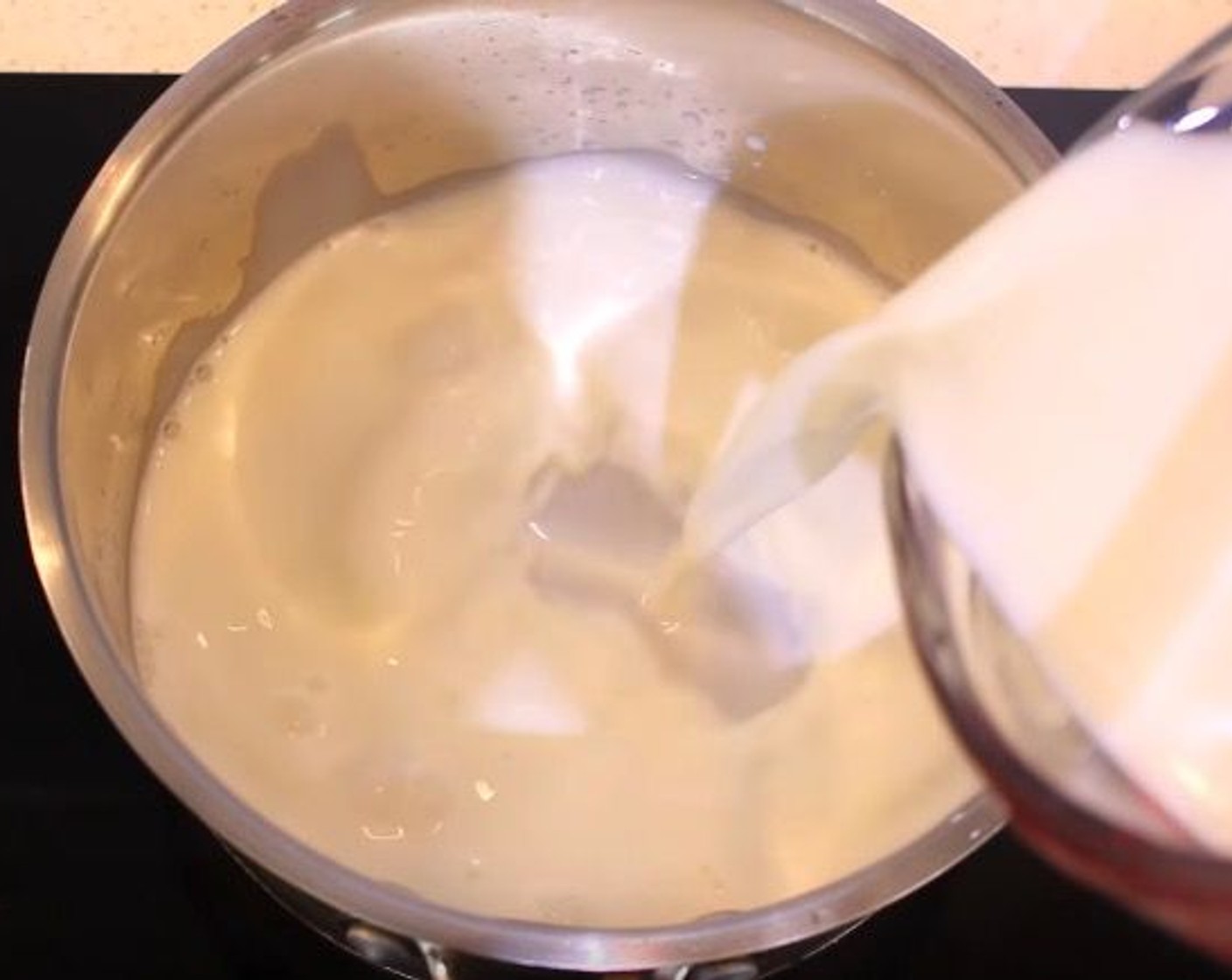 step 1 In a large saucepan, add the Whole Milk (3 1/3 cups) and Caster Sugar (1/2 cup). Heat gently until the sugar has dissolved.