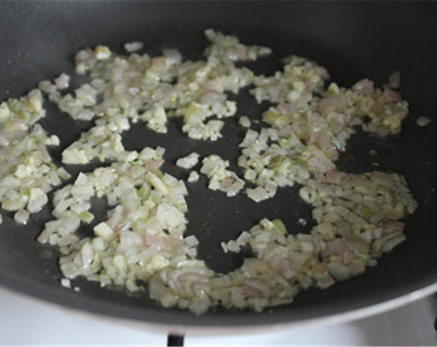 step 4 Heat Extra-Virgin Olive Oil (2 Tbsp) in an 8-10 inch non-stick pan. When hot, add chopped shallots and garlic and cook for 2 minutes.