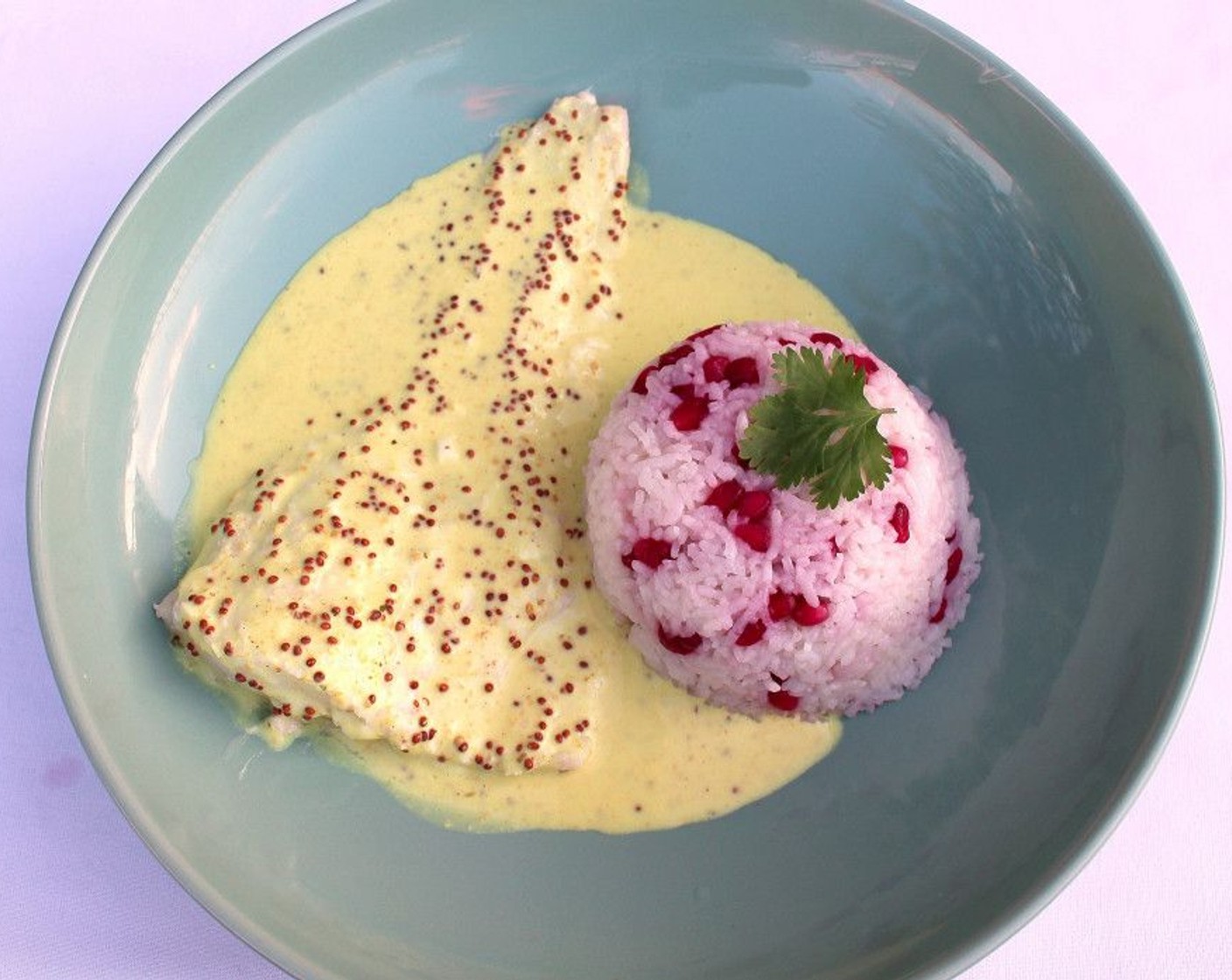 Poached Cod Fillet with Whole-Grain Mustard Sauce and Pomegranate Pilaf