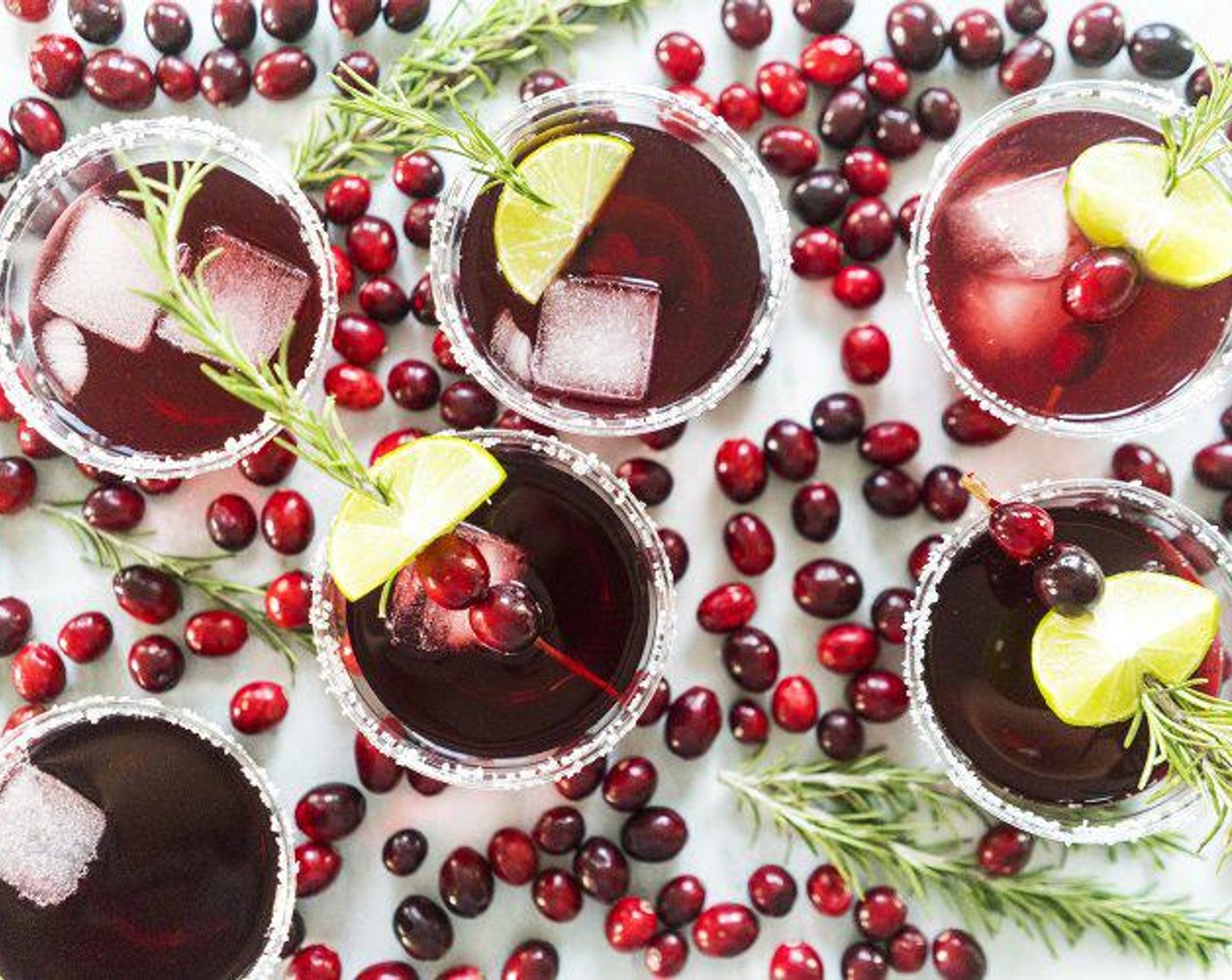 step 5 Garnish with Fresh Rosemary (1 sprig) speared with Fresh Cranberries (to taste) and the lime wedge. Serve and enjoy!