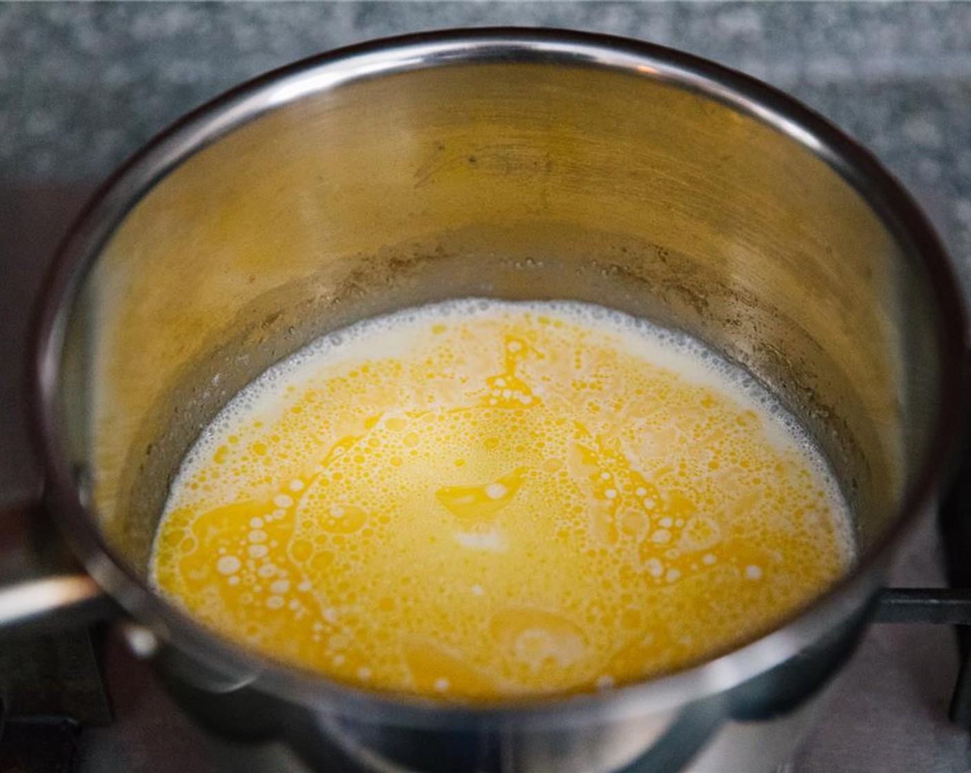 step 5 Heat the Milk (3/4 cup) and Salted Butter (1/3 cup) in a saucepan over a medium heat, until butter is melted.