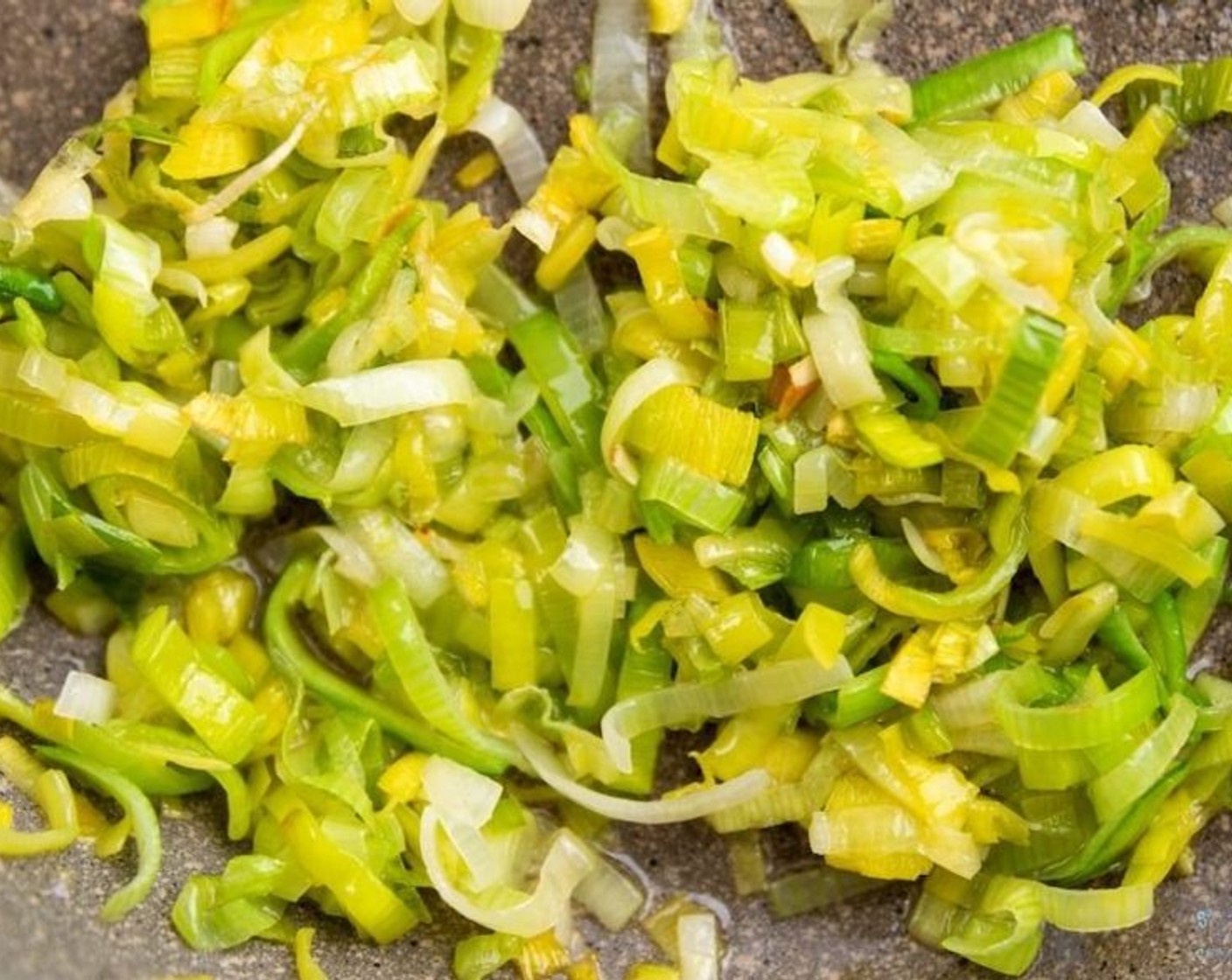 step 3 Heat Olive Oil (2 Tbsp) in a large skillet over medium-high heat. Once the oil is hot, add the sliced leeks and season with salt. Sauté for 8-10 minutes stirring occasionally.