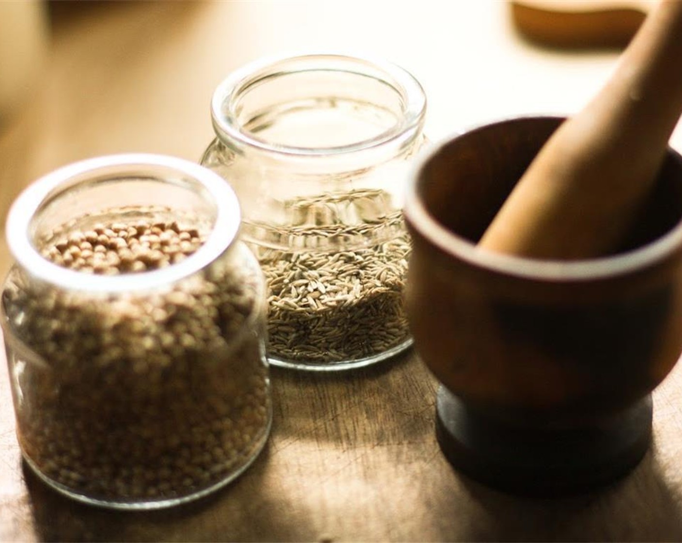 step 2 Grind the toasted seeds, Ground Ginger (1/2 tsp), Ground Cloves (1/2 tsp), Ground Cinnamon (1/2 tsp), Ground Allspice (1/2 tsp), Sweet Paprika (3 Tbsp), Crushed Red Pepper Flakes (1 Tbsp), Ground Turmeric (1 tsp) and Salt (1 tsp) using a coffee grinder or mortar and pestle. Remember to crush or grind the chili flakes.