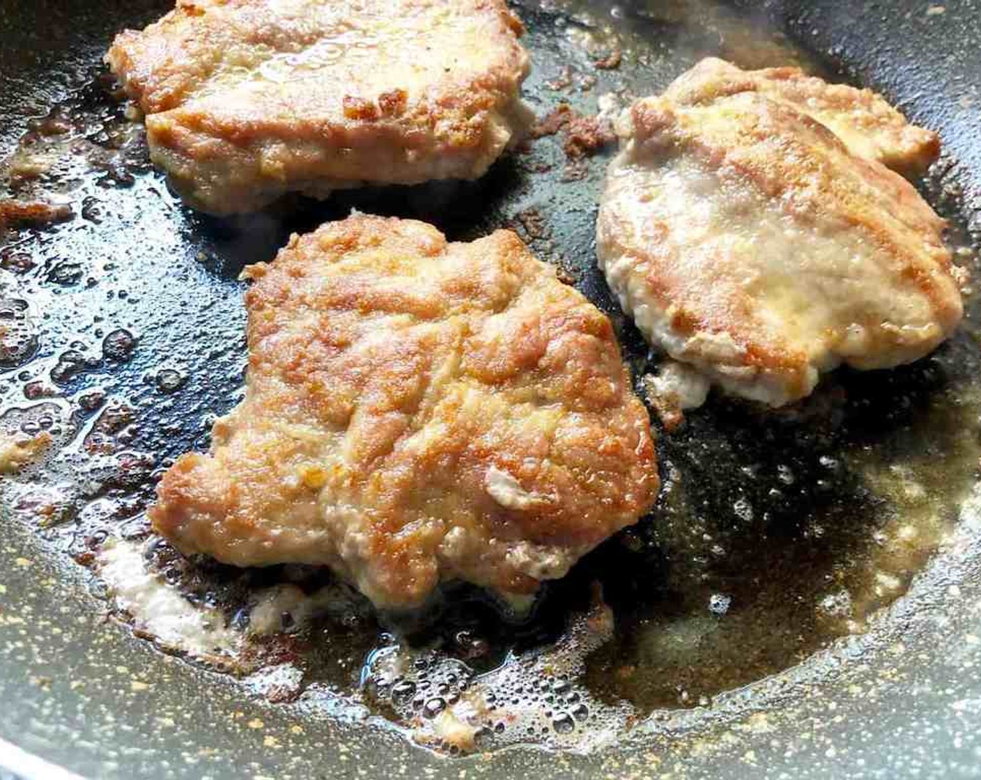 step 5 Saute' half the pork in the oil mixture, until the meat is lightly browned, about 2-4 minutes per side.