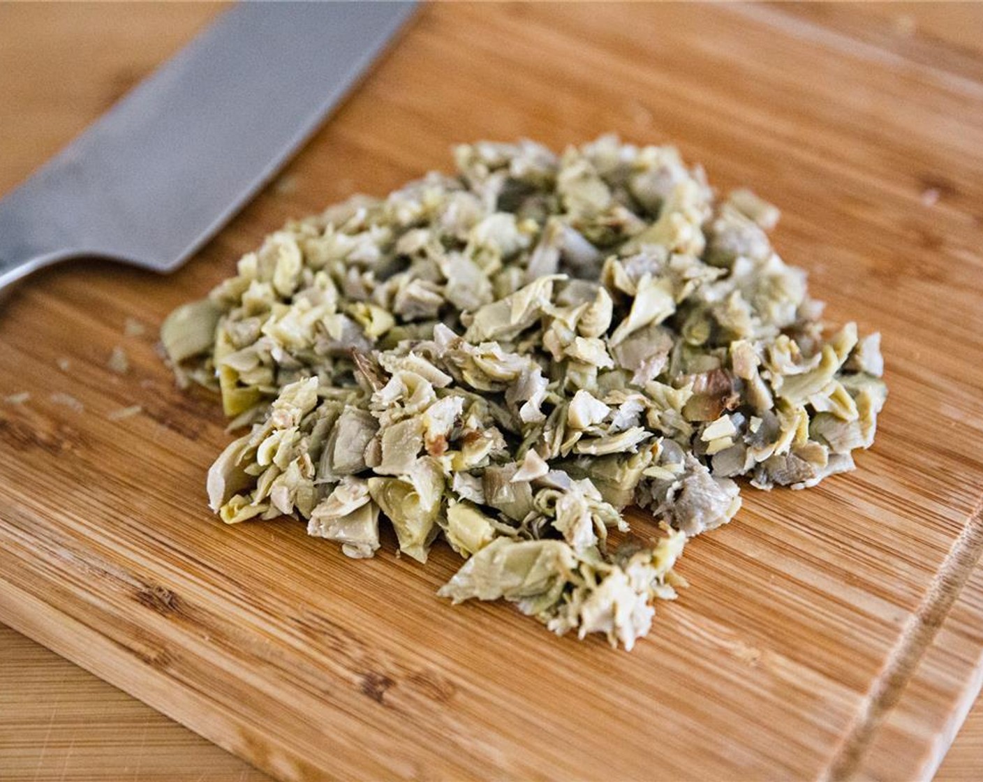 step 4 Finely chop the Marinated Artichokes (1/4 cup).