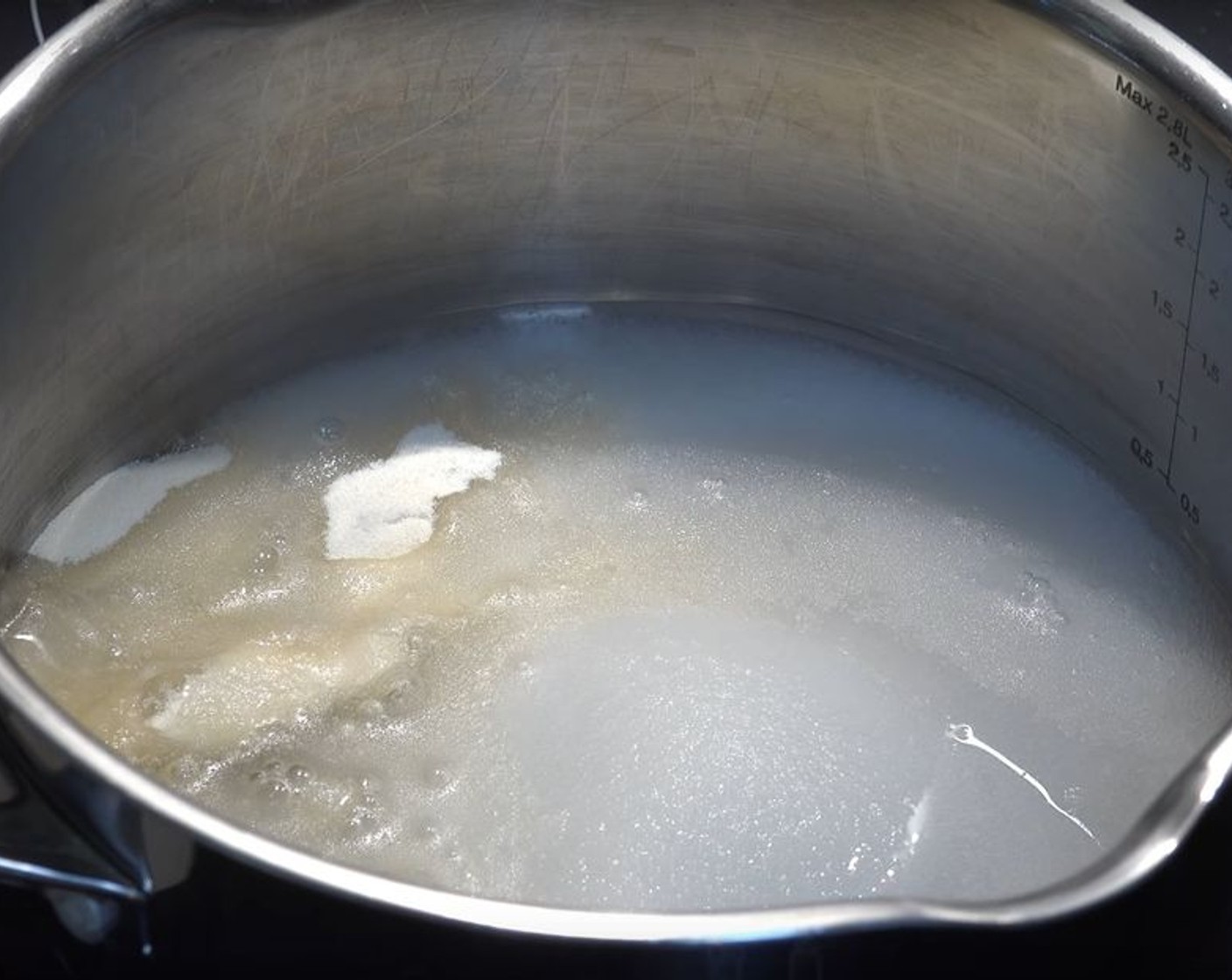 step 1 In a medium-size pan, add Granulated Sugar (1 cup), Gelatin Powder (1 Tbsp), and Water (3/4 cup). Stir until combined.