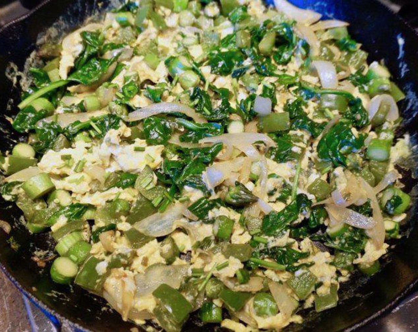 step 5 Return pan to low heat and add Eggs (4). Cook, stirring frequently, until eggs are just barely set. This will happen fast, only about 1 minute. Immediately remove from heat and gently fold in reserved vegetable mixture. Season with Salt (to taste) and Ground Black Pepper (to taste) and sprinkle with Fresh Chives (2 Tbsp), if using.