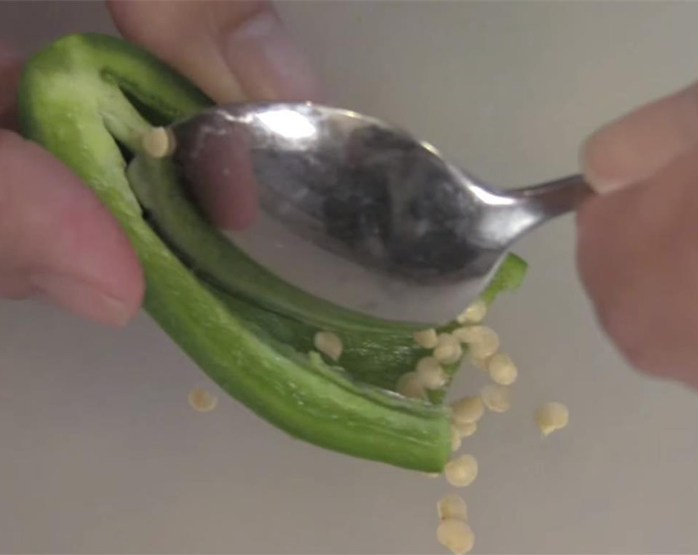 step 2 Fry the Bacon (6 slices) and set aside. Rinse the Jalapeño Peppers (16), and pat dry. De-stem them, and cut in half lengthwise. Take a small knife, and remove as much of the seeds and membranes as you like.