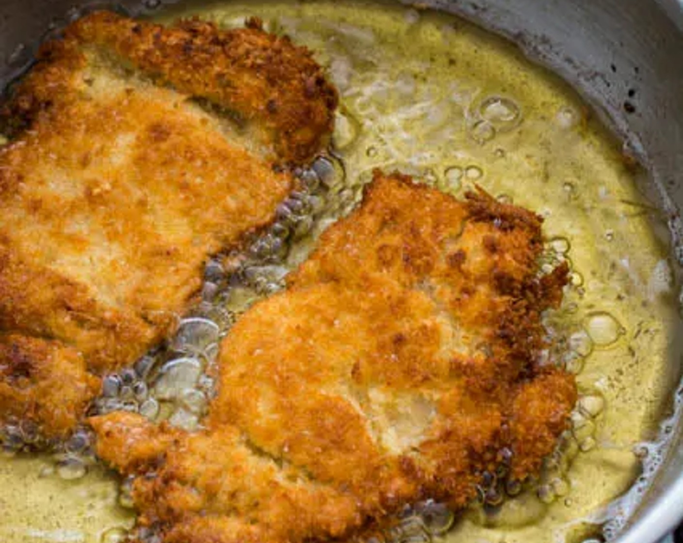 step 6 Fry the chicken in small batches until golden brown, about 2 minutes on each side.