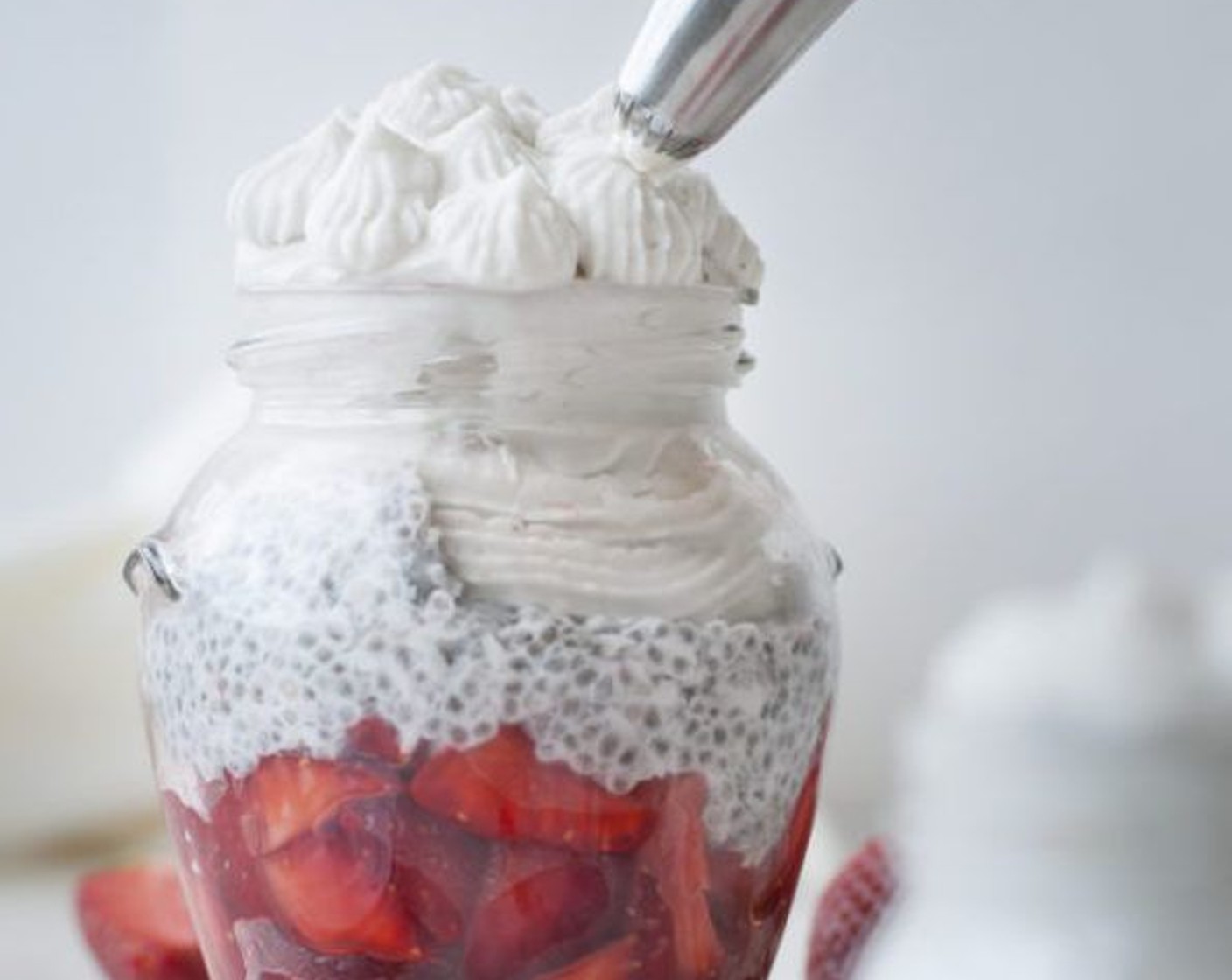 step 8 Add the whipped cream on top of the chia pudding.